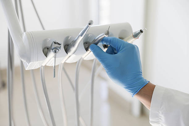 Professional Tooth Extraction technician working in Irvine, KY